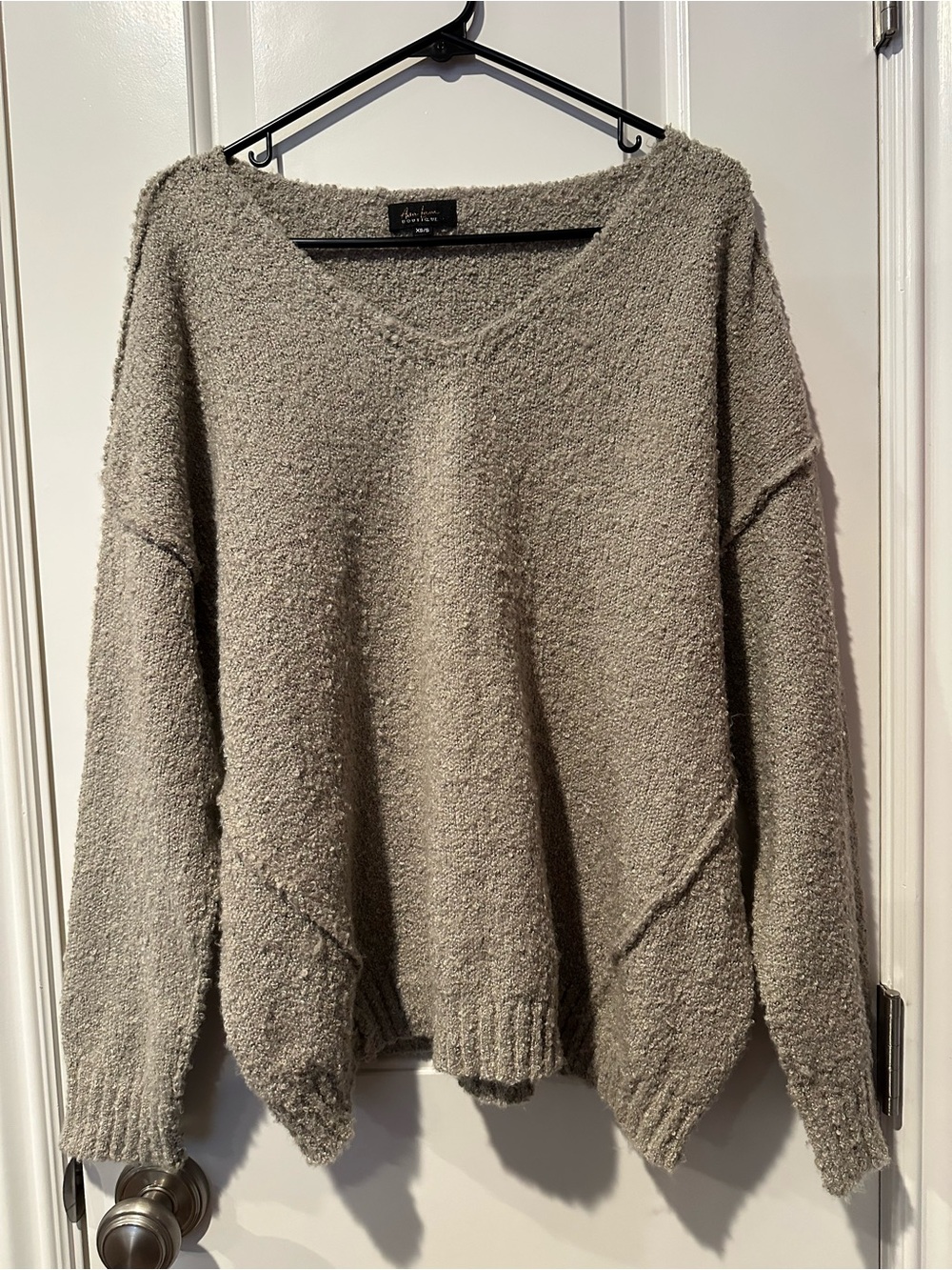 Cozy V-Neck Bouclé Sweater in a Light Gray/Green